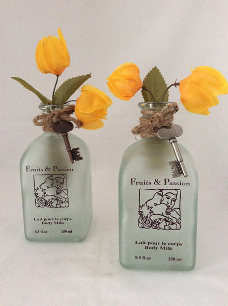 Glass Bottle Vase With Yellow Bougainvillea Flowers